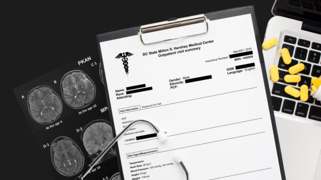 Redacted medical record, highlighted PHI that has been redacted to protect data privacy in healthcare industry